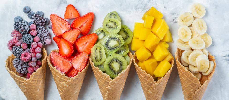 ice cream cones filled with fruit