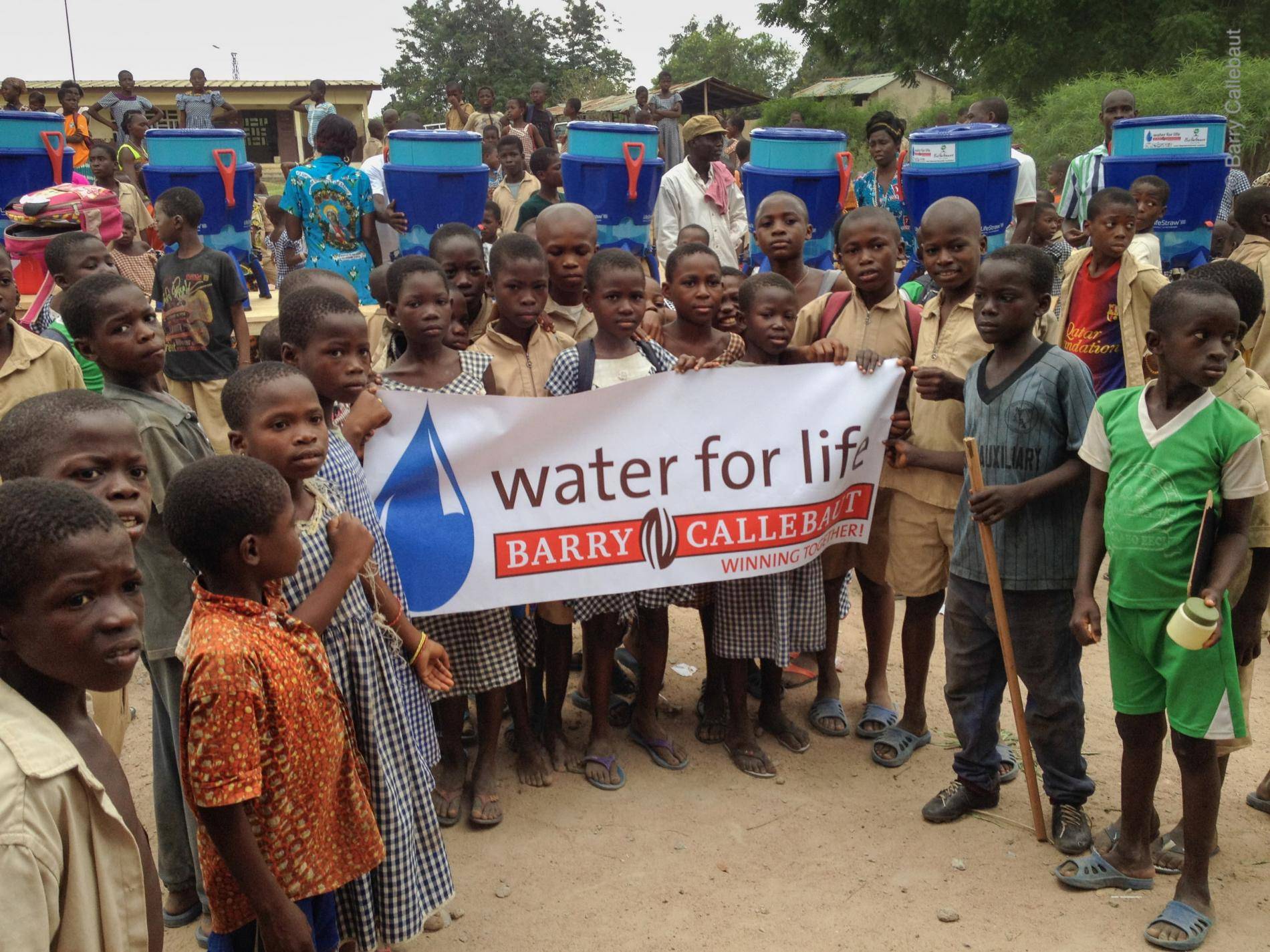 Distributing water filters in remote cocoa areas of West Africa Barry