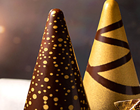 3D dark chocolate star, gold pattern, star-shaped white cake