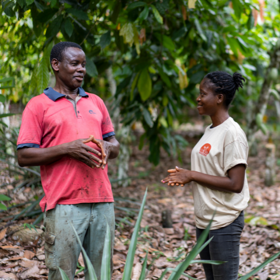 Cocoa horizons coach with farmer