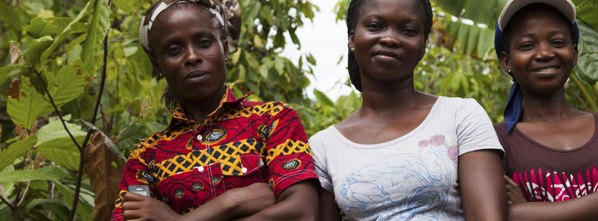 Three woman farmers standing side by side