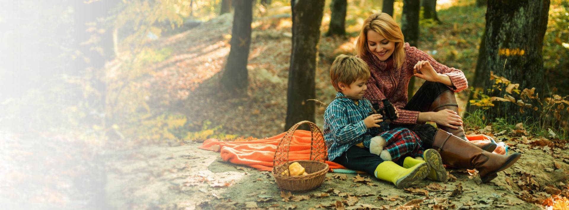 mother and son having a picnic together