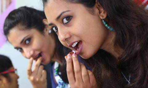 Ladies tasting chocolate at opening ceremony of relocated Callebaut® CHOCOLATE ACADEMY™ center in Mumbai