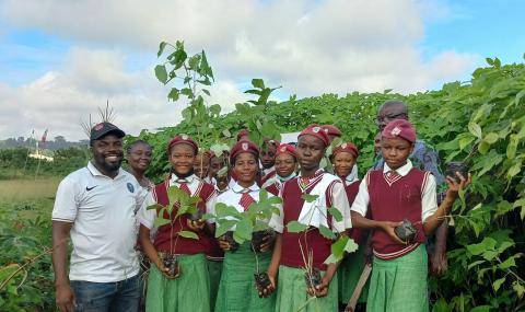 Nigerian students with tree seedlings