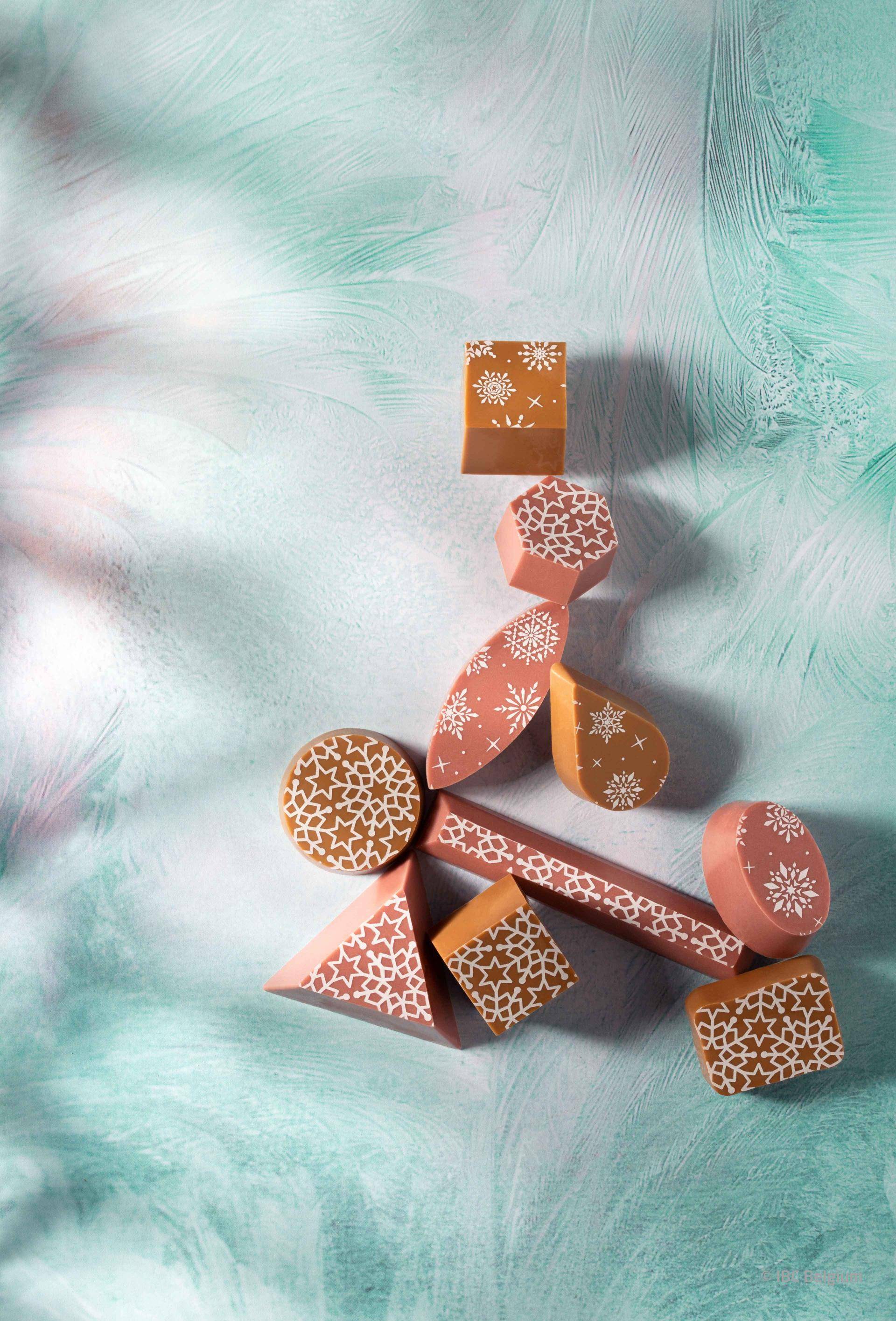 Ruby chocolate and Caramel pralines, snowflake inspired transfer