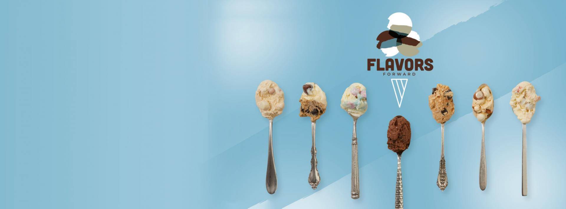 spoons with ice cream on them on a blue background