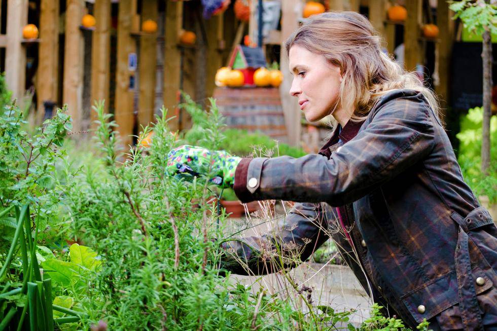 Generation X woman gardening