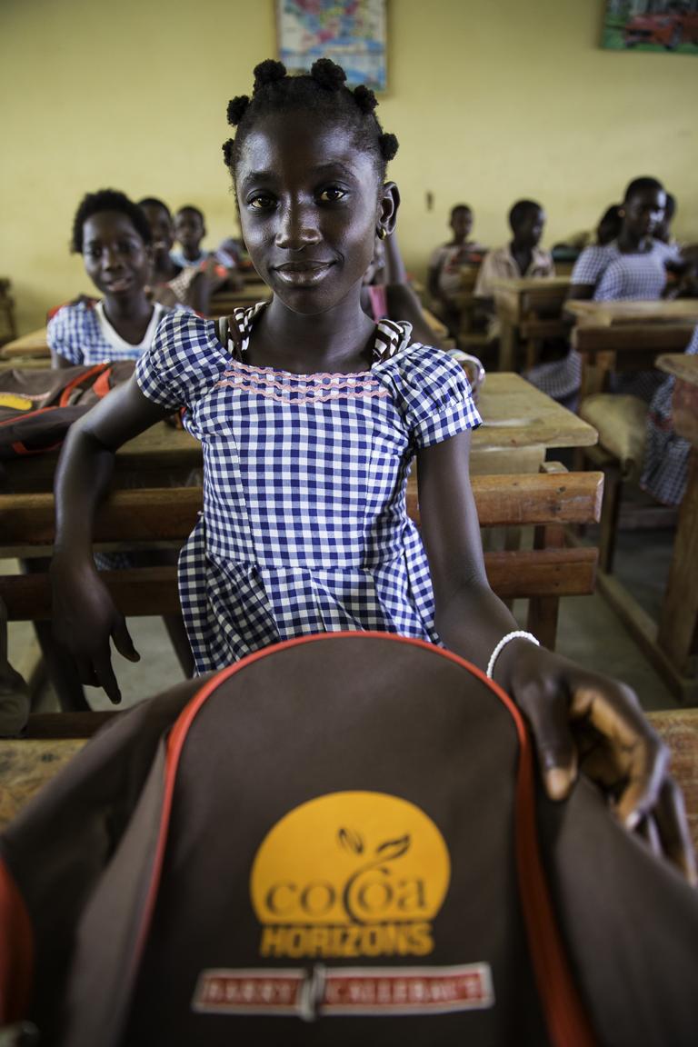 School girl with Cocoa Horizons school backpack