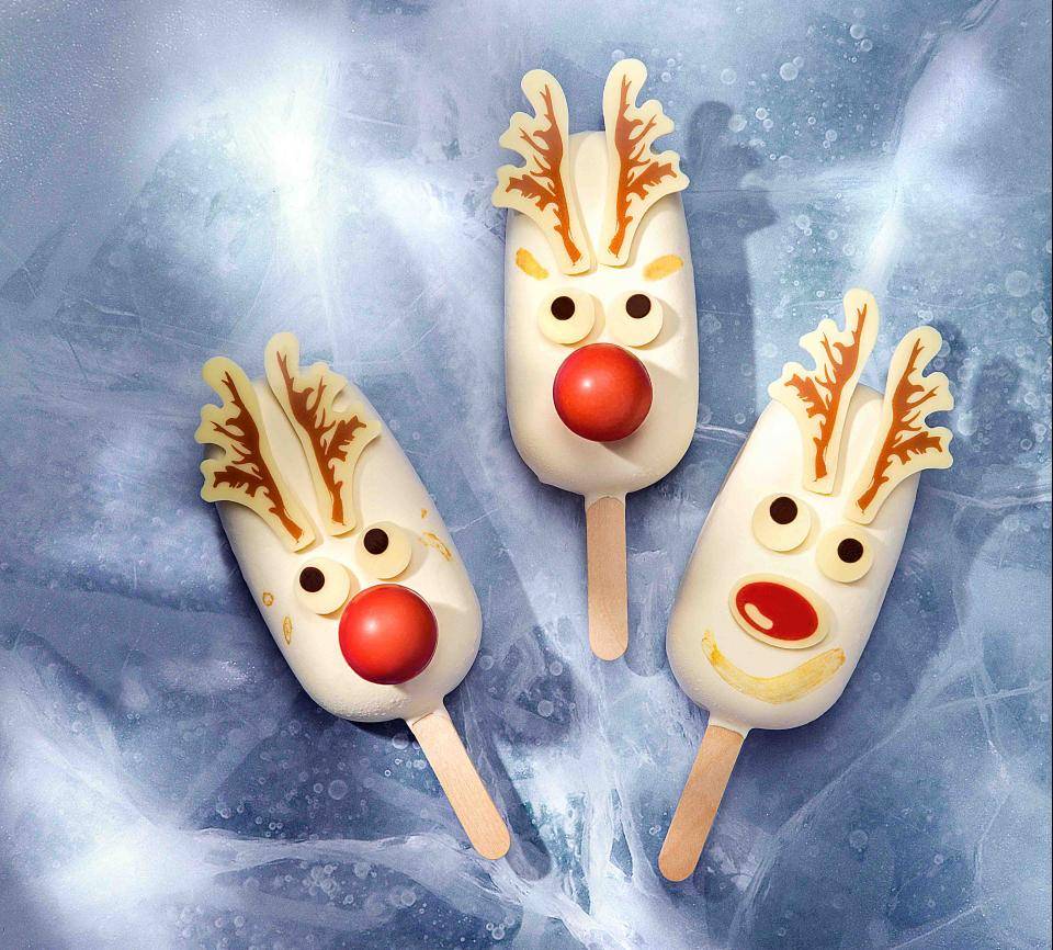 white chocolate ice-cream sticks, reindeer antlers,red printed chocolate noses