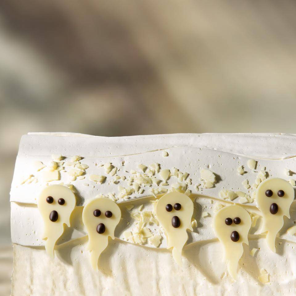 Chocolate ghosts on a cake