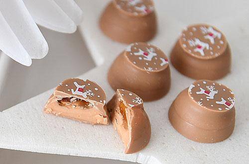 Symphony of caramel chocolates with deer print