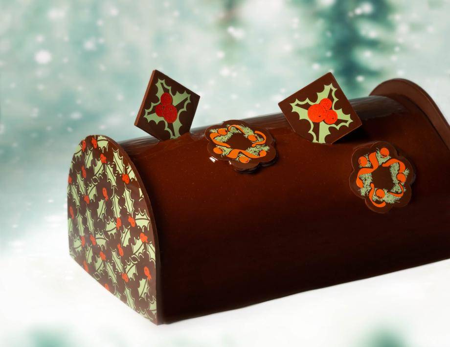 glossy dark chocolate,plaques with a holly leaf and Christmas wreath prints
