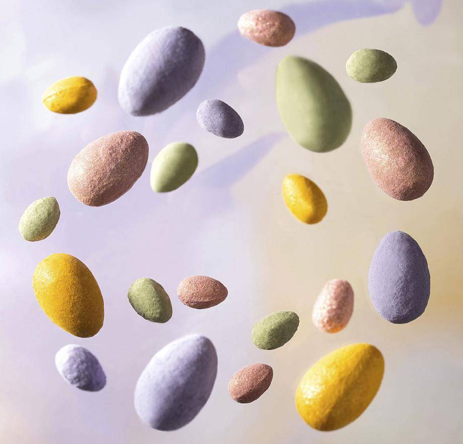 Pastel Easter eggs with colored truffle powder