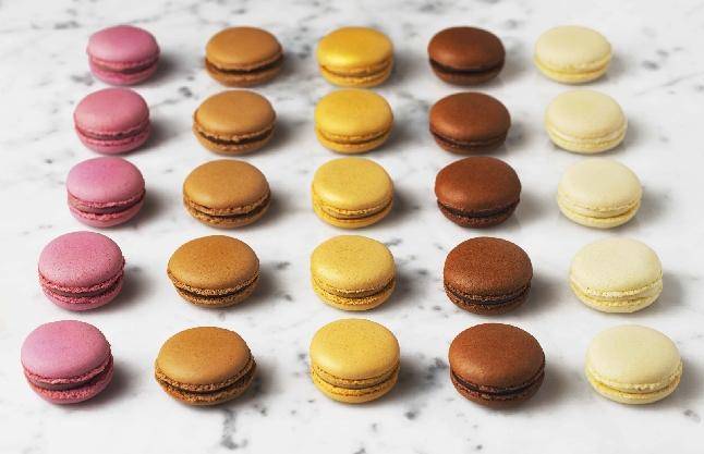macarons on white marble counter