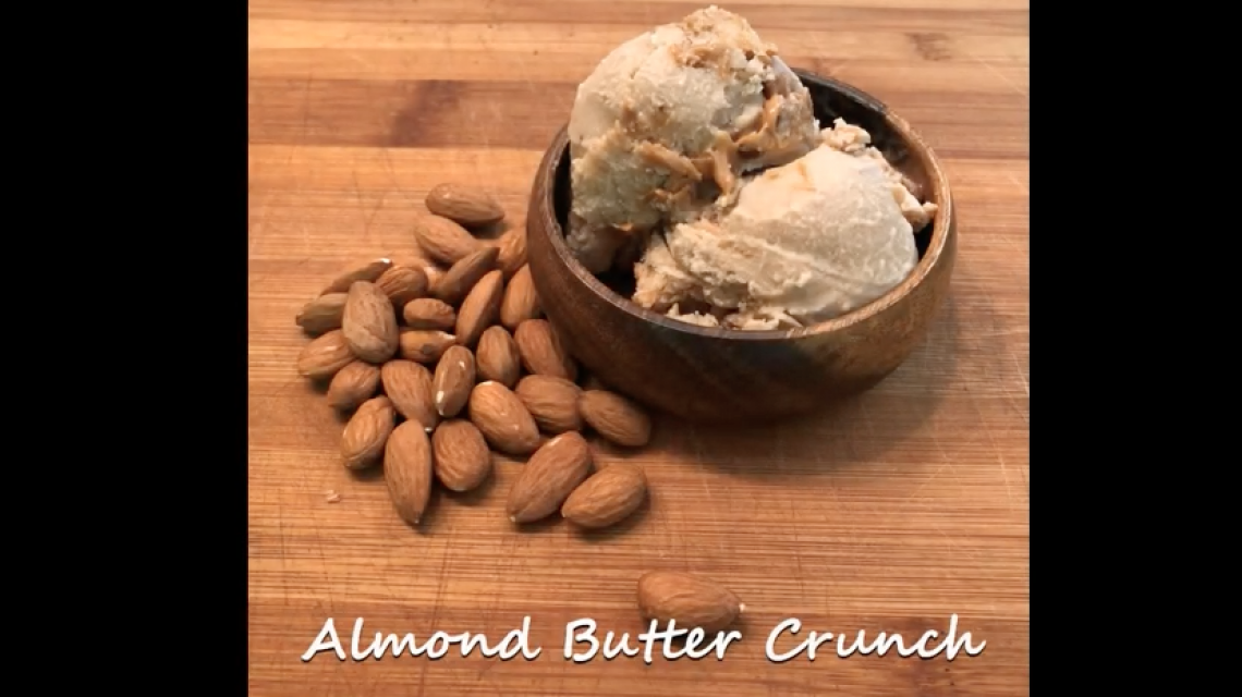 almond butter crunch ice cream - bowl of ice cream with almond next to it