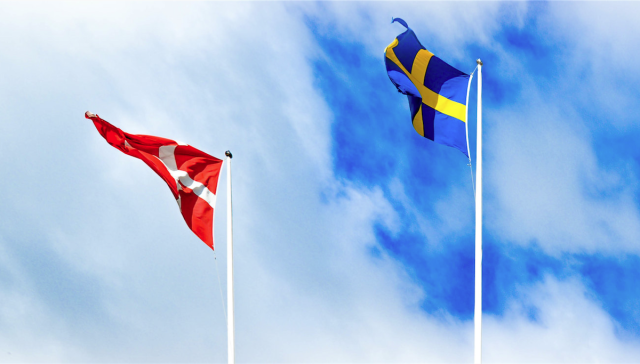 flags of Denmark and Sweden