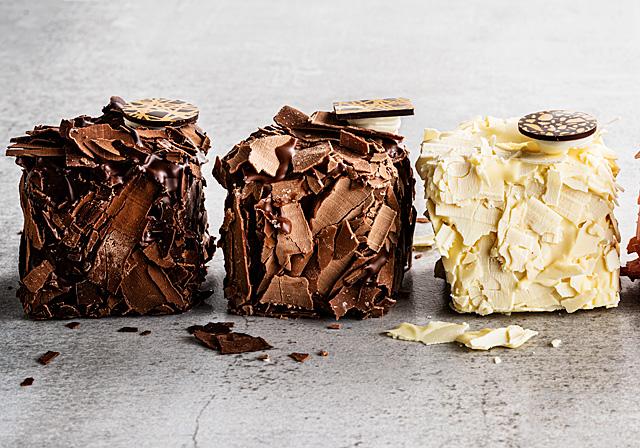 Merveilleux pastries with white, milk and dark chocolate shavings