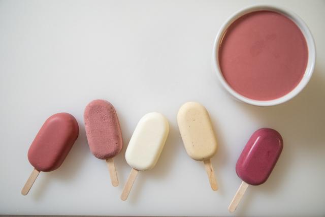 ice cream bars coated in ruby chocolate 