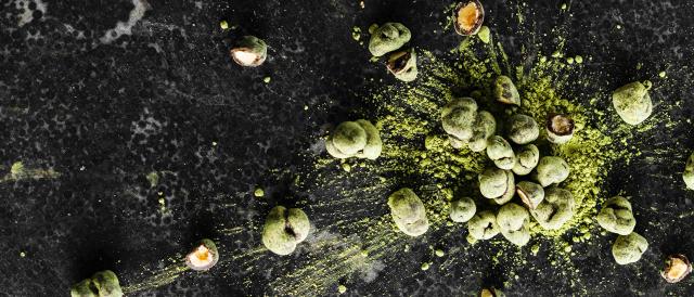 Confectionery Nibbles or Dragees - Hazelnuts in chocolate and matcha powder 