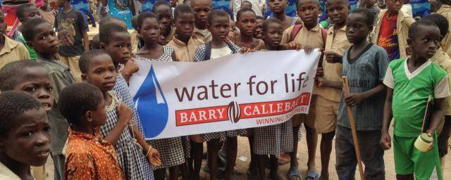 Distributing water filters in remote cocoa areas of West Africa