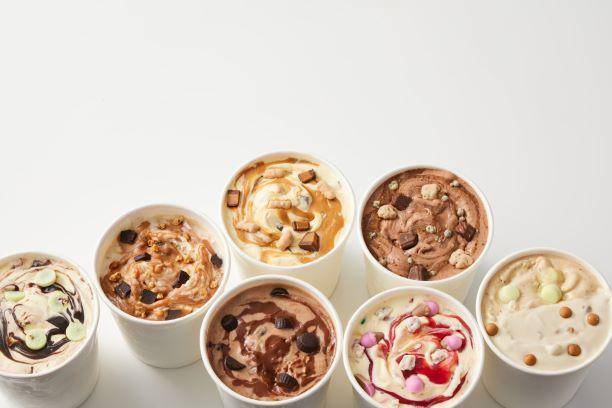cups of ice cream on white background