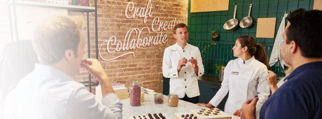 chef martin explaining concept to customers